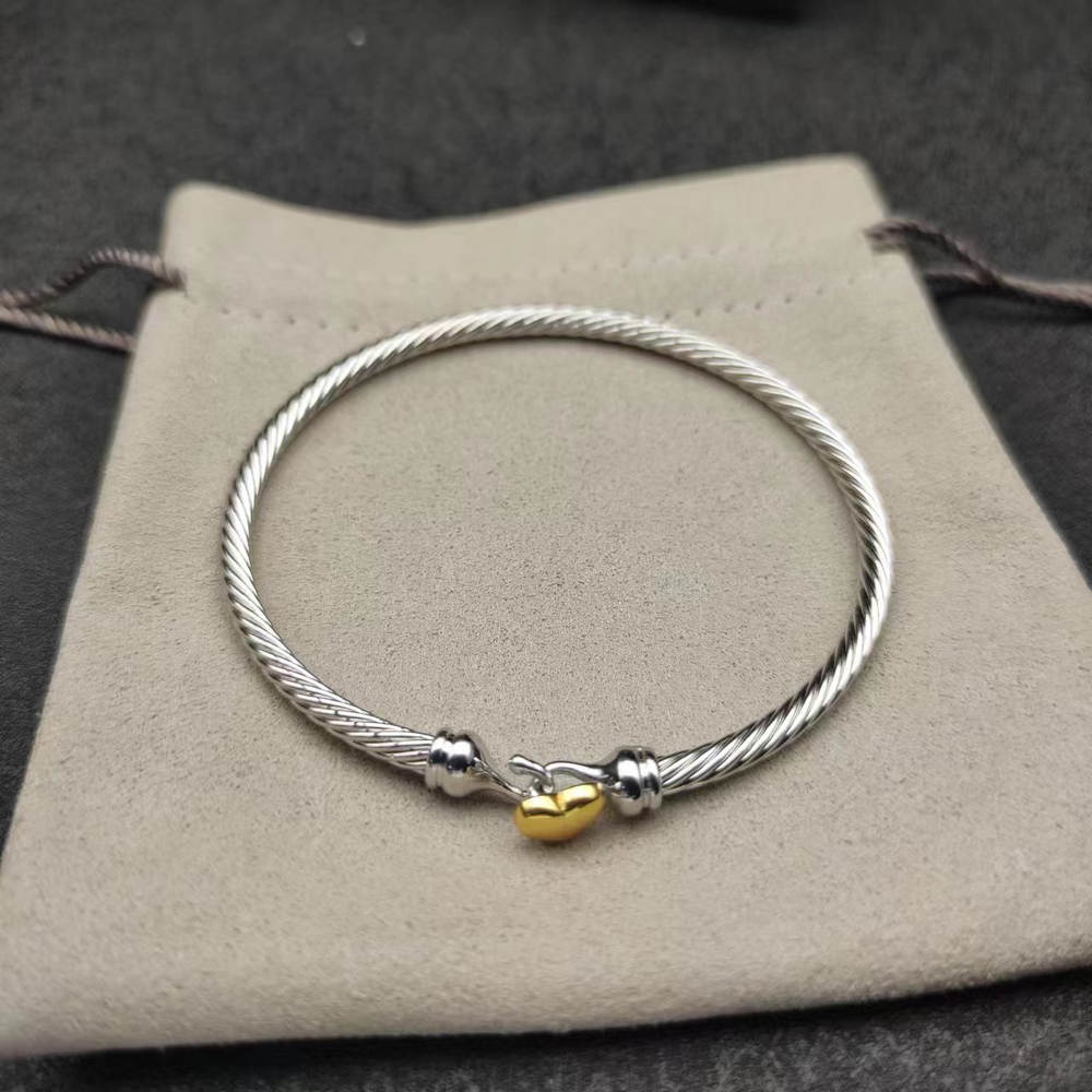 David Yurman's gold heart-shaped silver bracelet - Picture 2 of 9